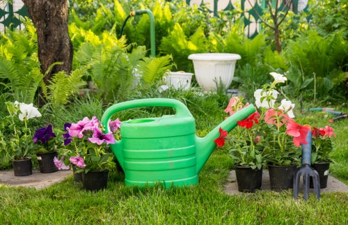 Safety-focused gardening team completing a tidy and secure finish